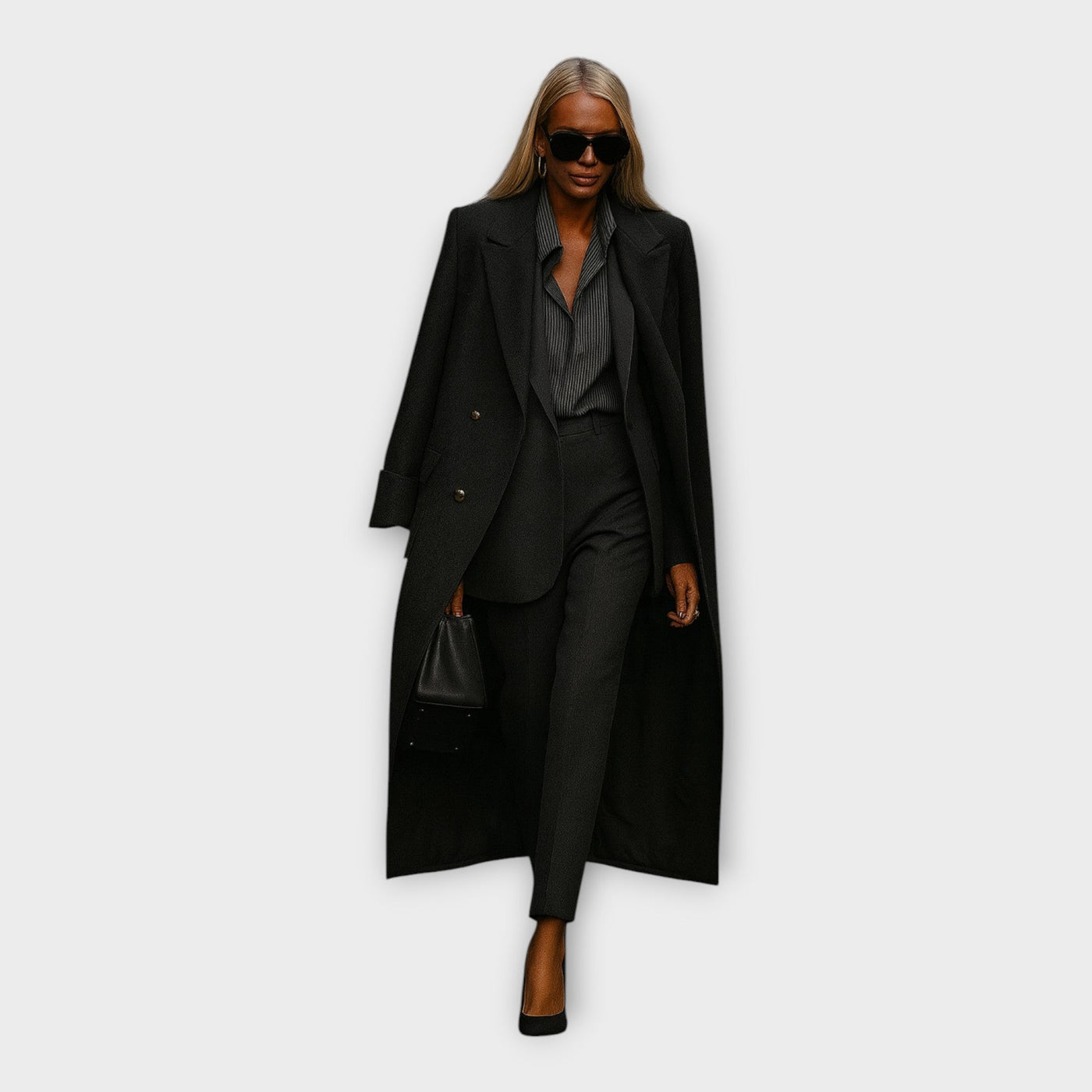 Κομψό σετ με παντελόνι και παλτό σε minimal γραμμή 