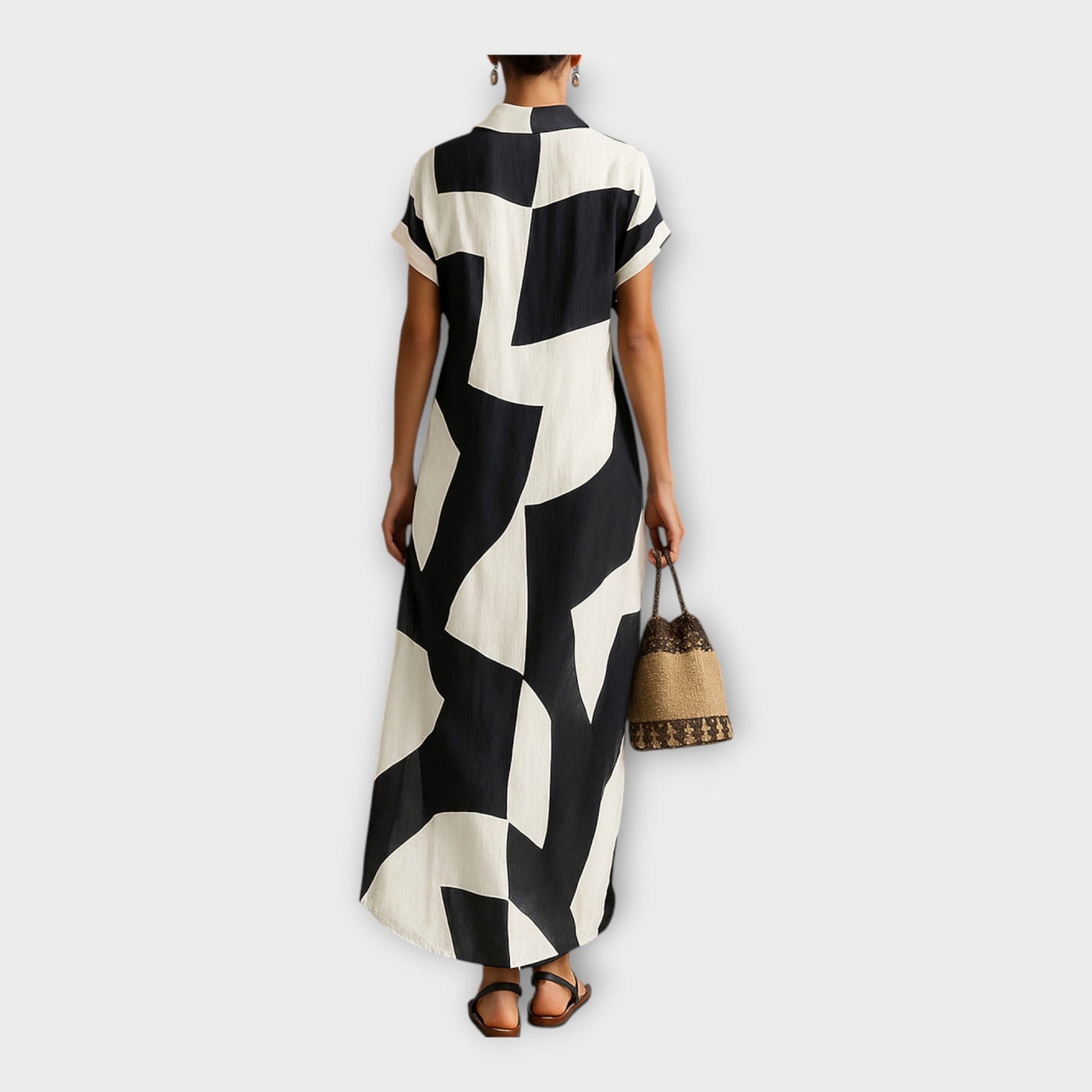 Κομψό μακρύ φόρεμα με μοντέρνο σχεδιασμό και διαχρονική φινέτσα